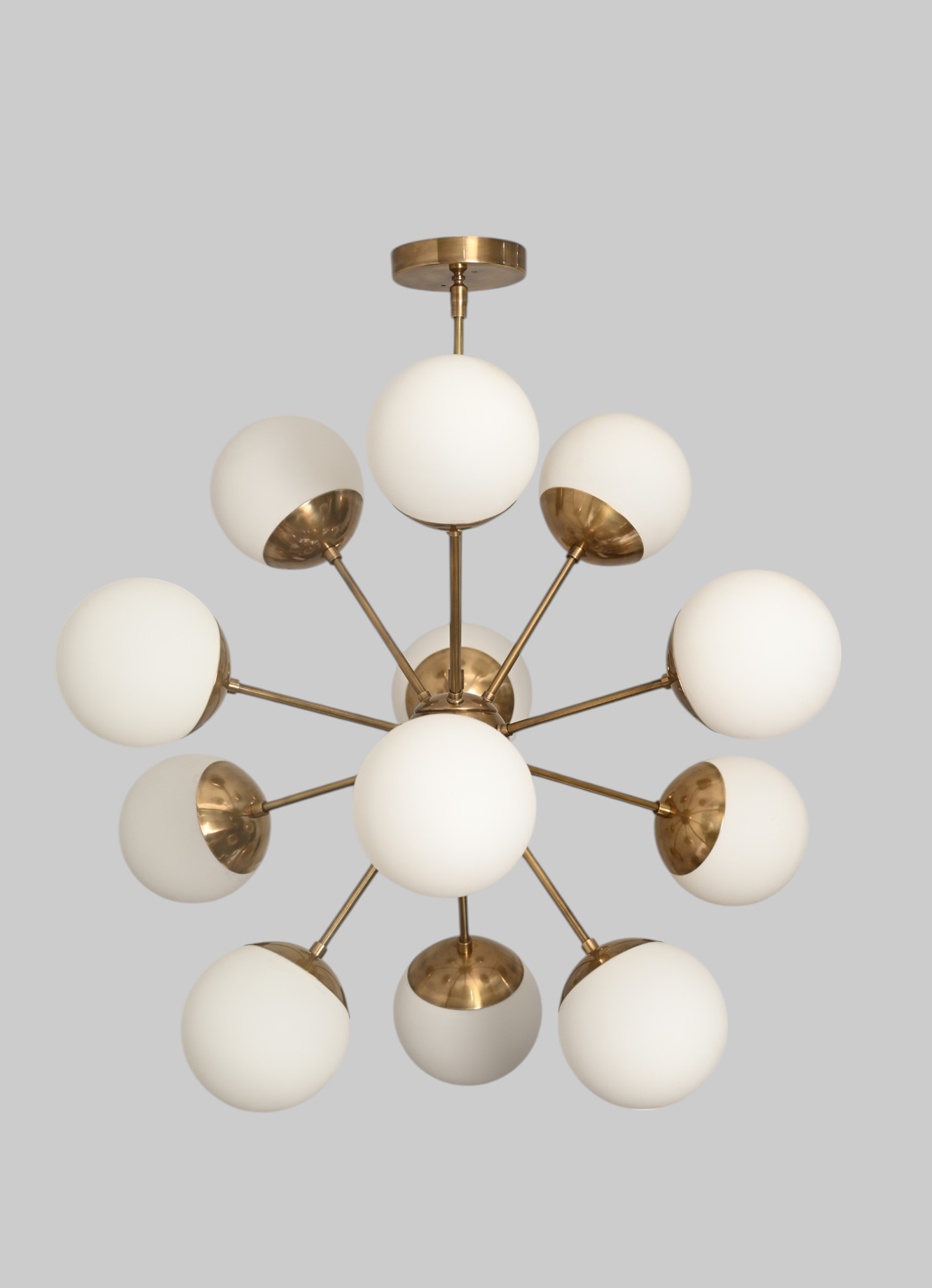 12 Globe Lights chandelier offers stunning, modern design and elegant, ambient lighting