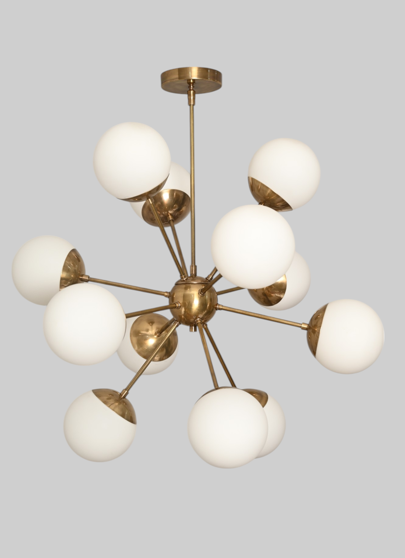 12 Globe Lights chandelier offers stunning, modern design and elegant, ambient lighting