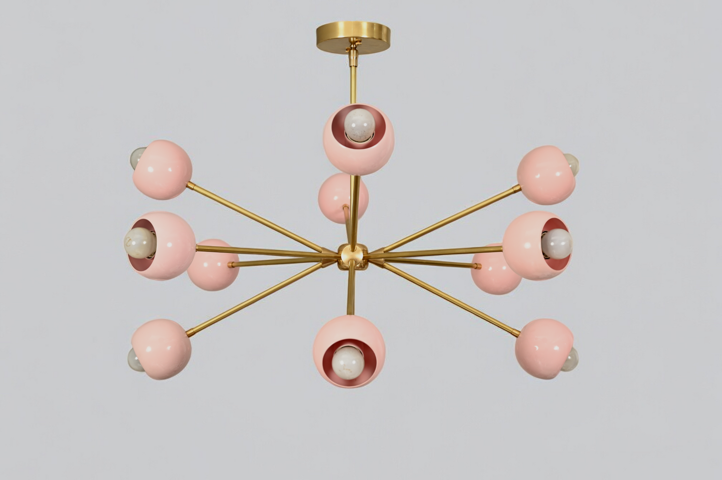 Elegant twelve-arm light pink Sputnik chandelier, a vibrant mid-century starburst fixture
