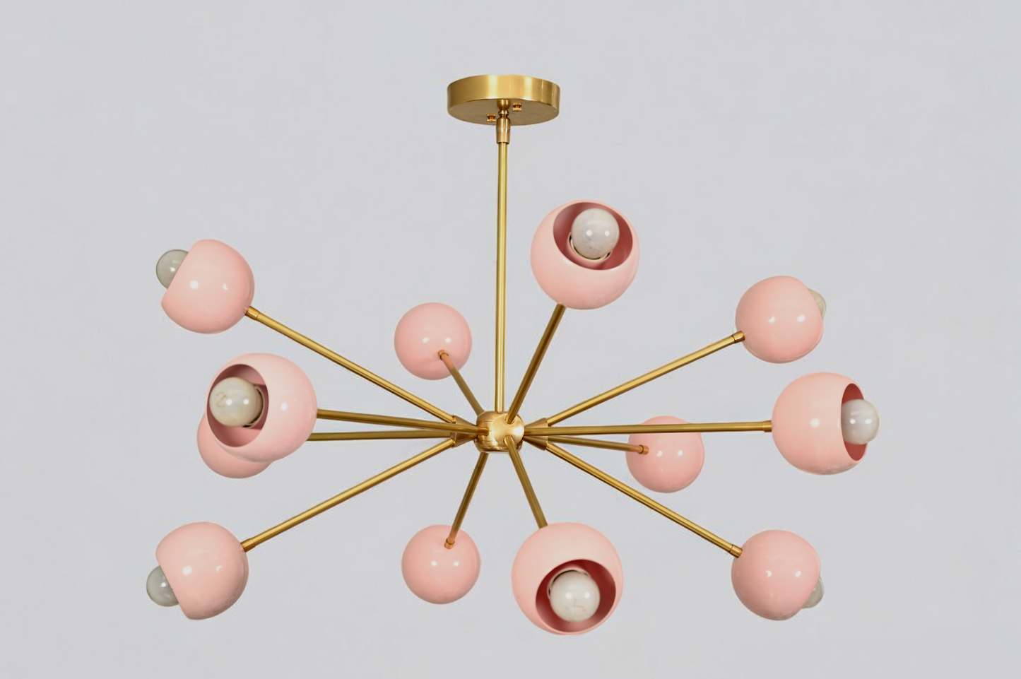 Elegant twelve-arm light pink Sputnik chandelier, a vibrant mid-century starburst fixture