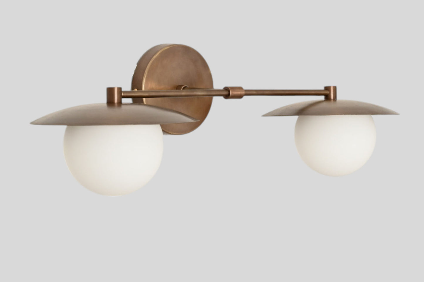 Mid-Century Double Globe Wall Sconce: Brass with opal glass, timeless vintage charm