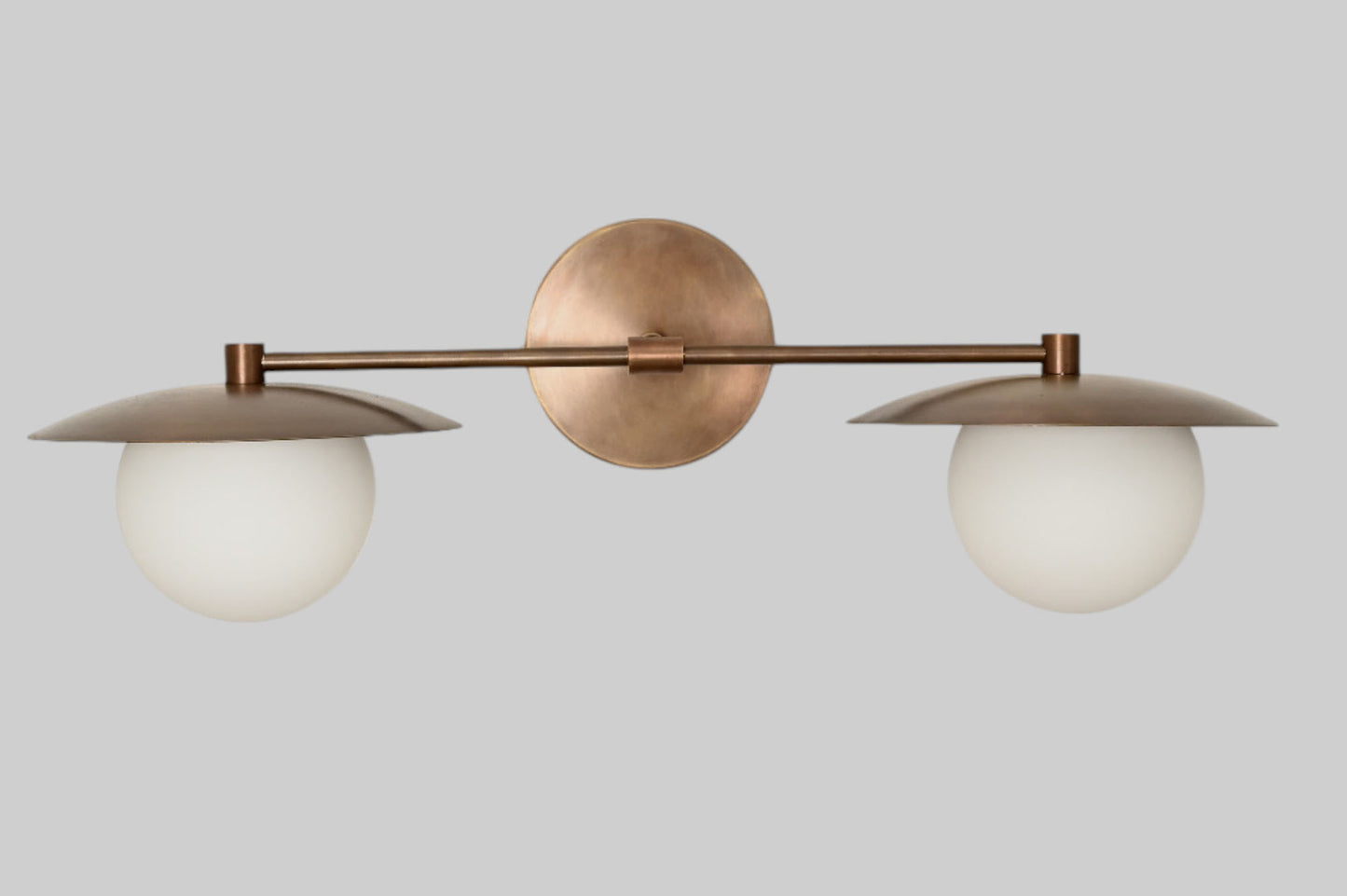 Mid-Century Double Globe Wall Sconce: Brass with opal glass, timeless vintage charm