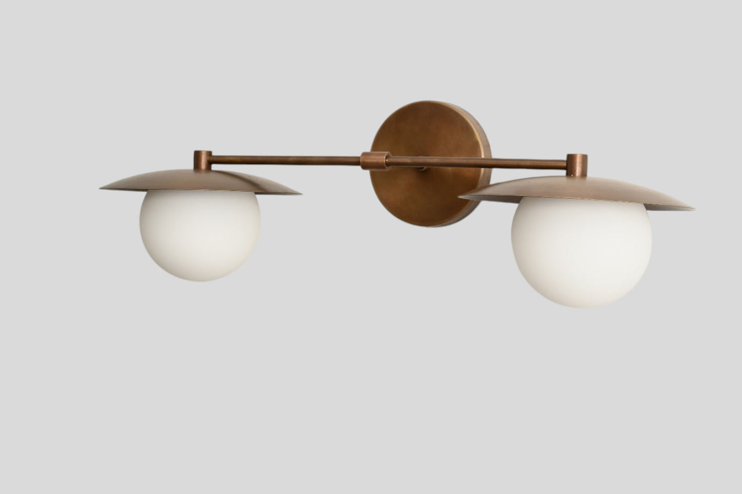 Mid-Century Double Globe Wall Sconce: Brass with opal glass, timeless vintage charm