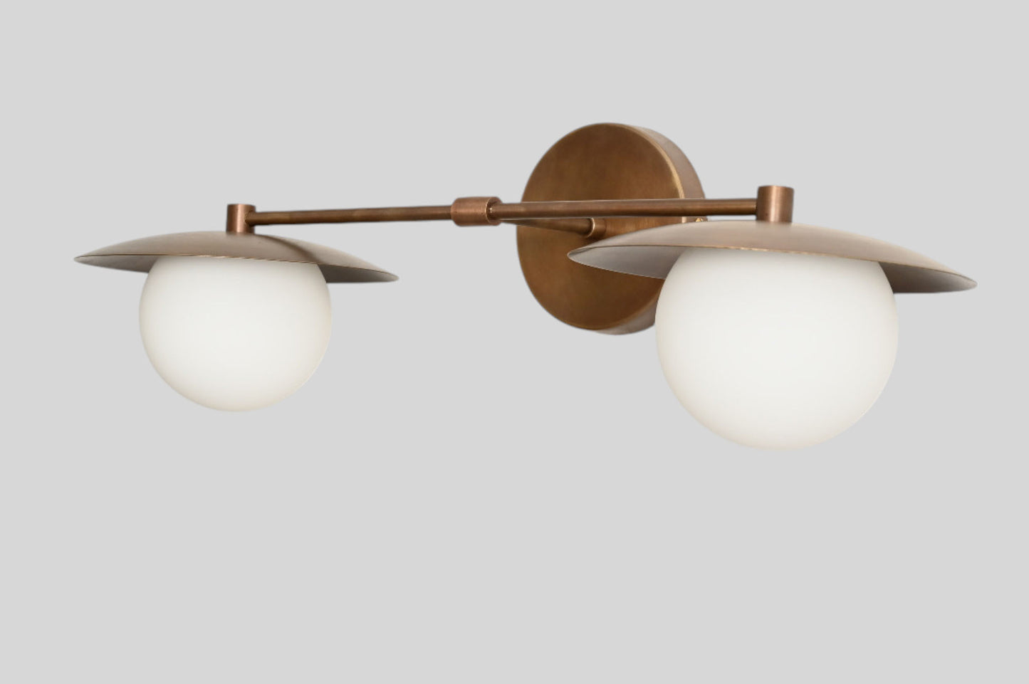 Mid-Century Double Globe Wall Sconce: Brass with opal glass, timeless vintage charm