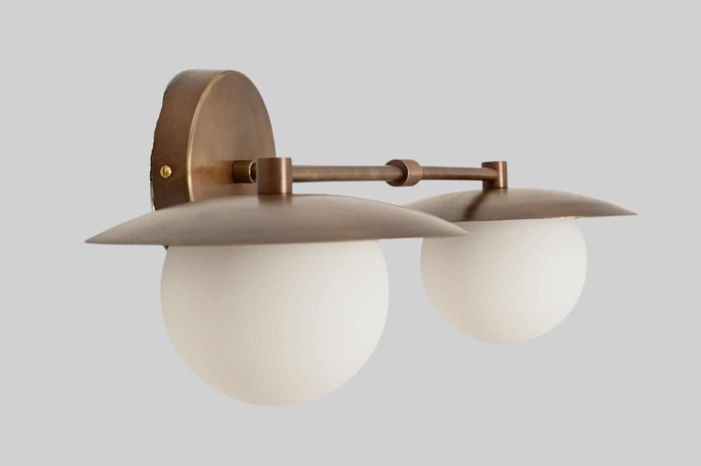 Mid-Century Double Globe Wall Sconce: Brass with opal glass, timeless vintage charm