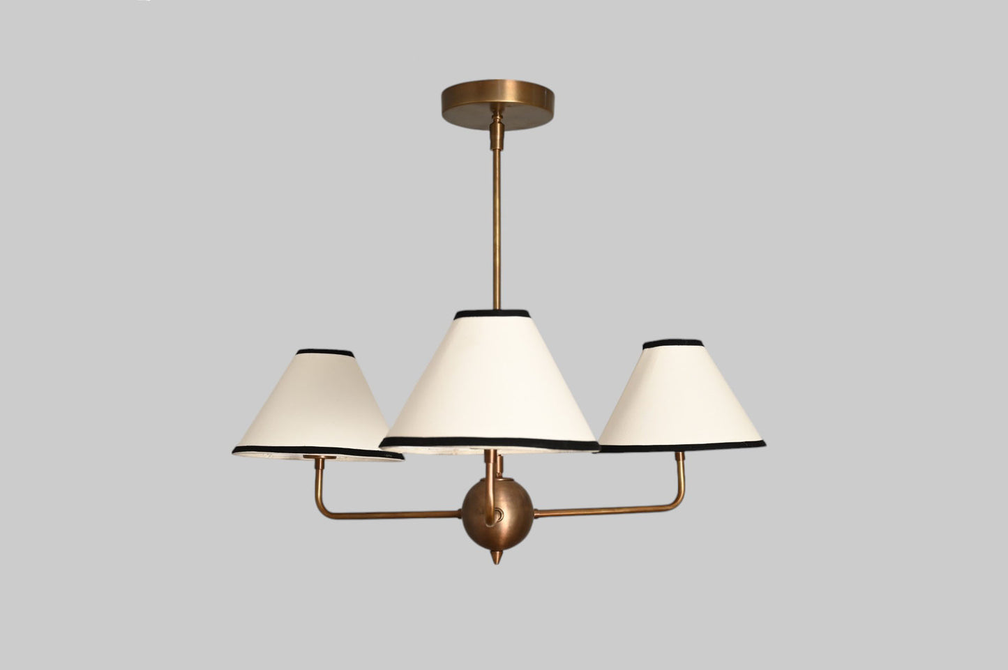 3-shade brass chandelier with unique finish variations for a one-of-a-kind design