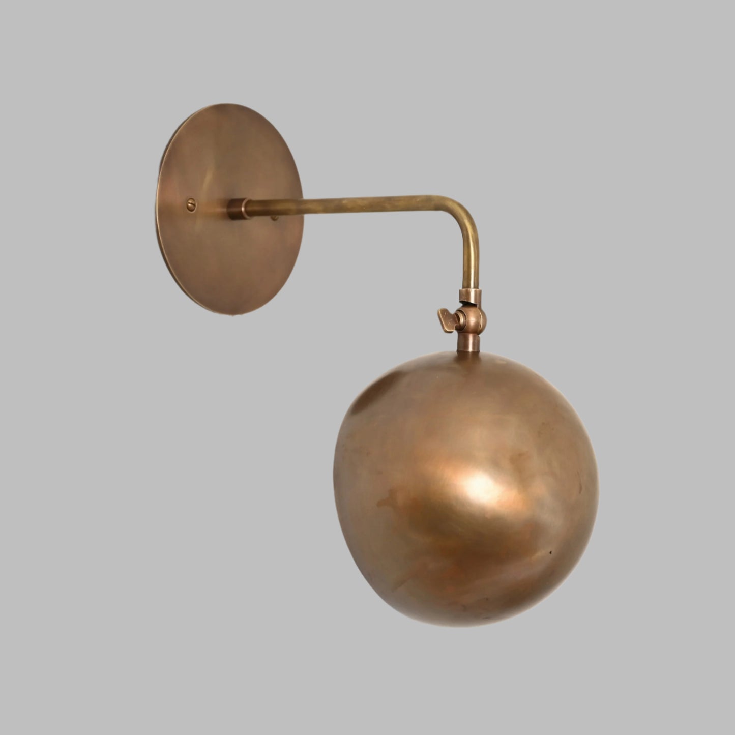 1-Light Mid-Century Wall Sconce in Raw Brass - Illuminate your space with our vintage lamps