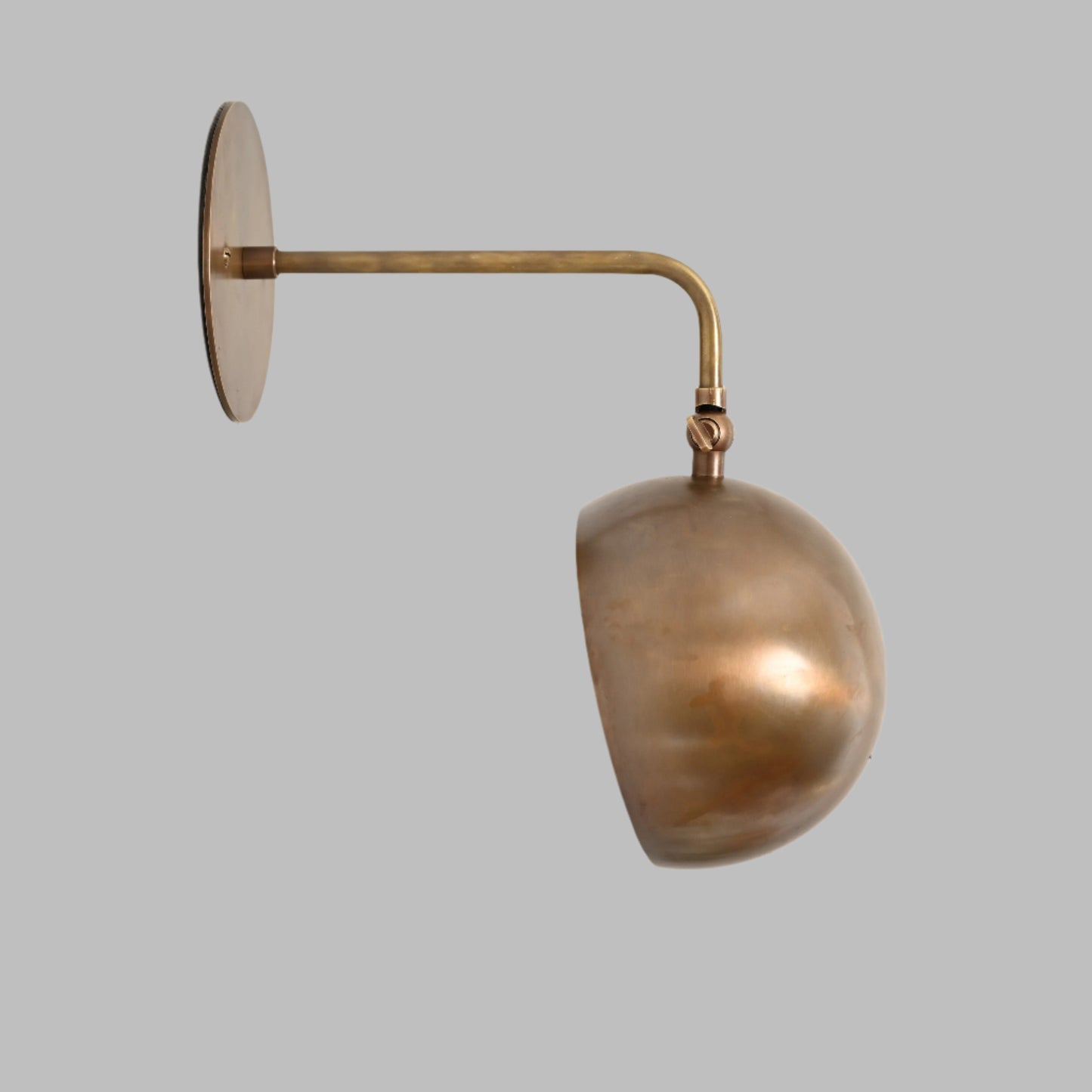 1-Light Mid-Century Wall Sconce in Raw Brass - Illuminate your space with our vintage lamps