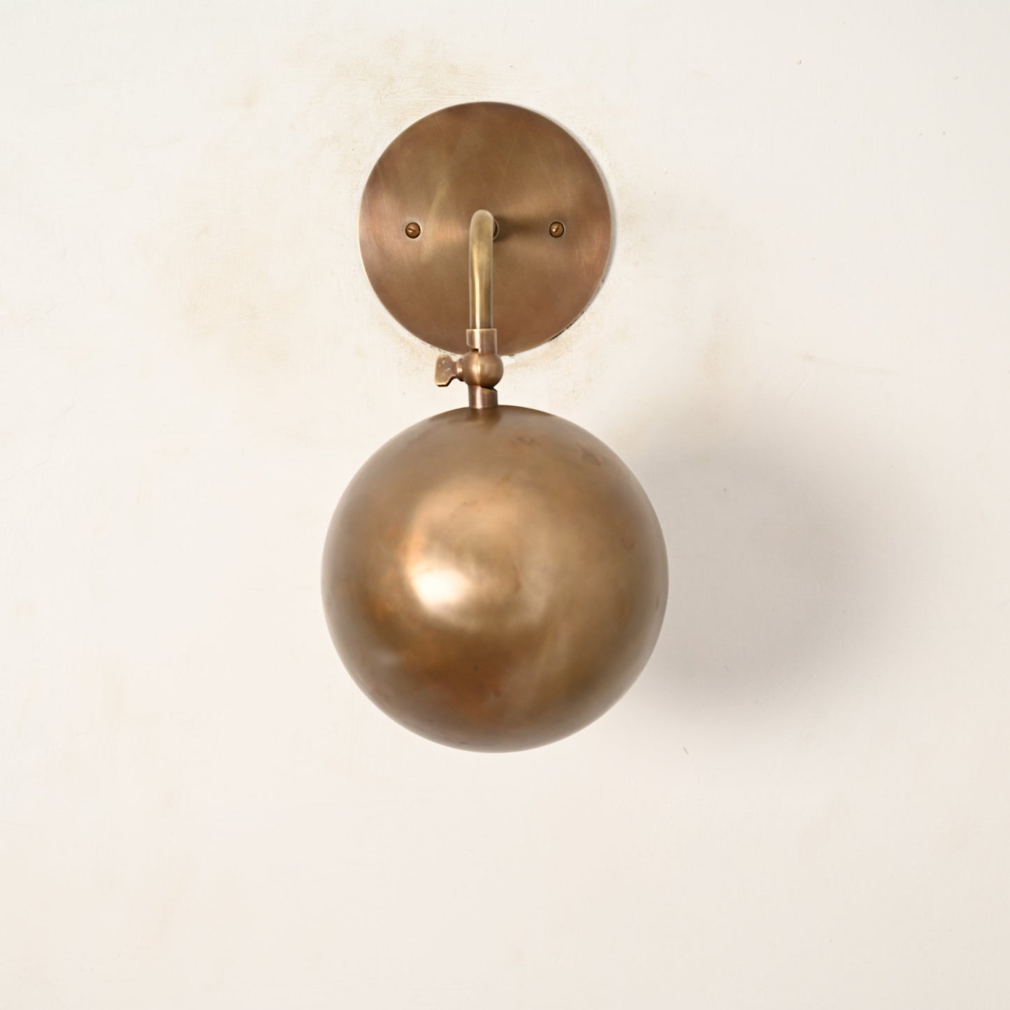 1-Light Mid-Century Wall Sconce in Raw Brass - Illuminate your space with our vintage lamps