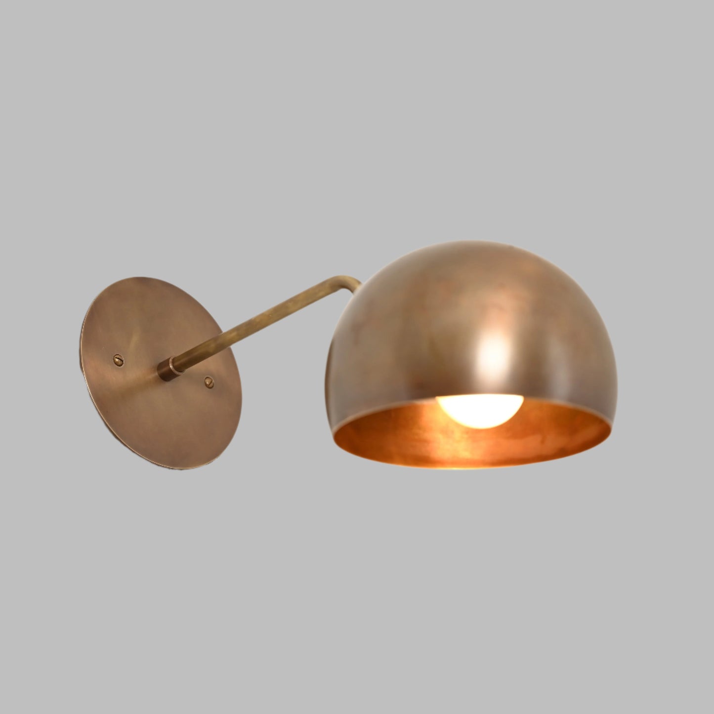 1-Light Mid-Century Wall Sconce in Raw Brass - Illuminate your space with our vintage lamps