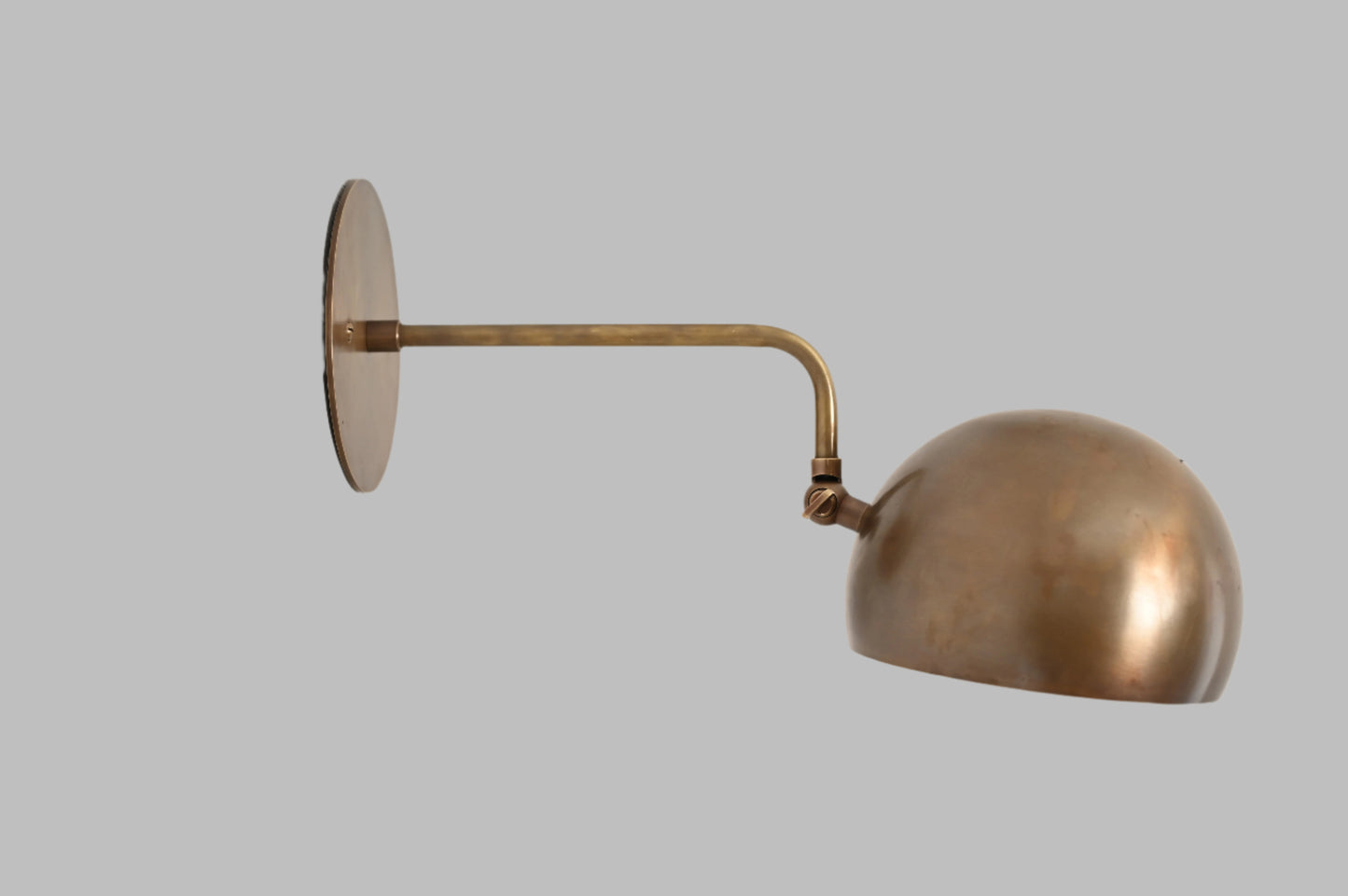 1-Light Mid-Century Wall Sconce in Raw Brass - Illuminate your space with our vintage lamps