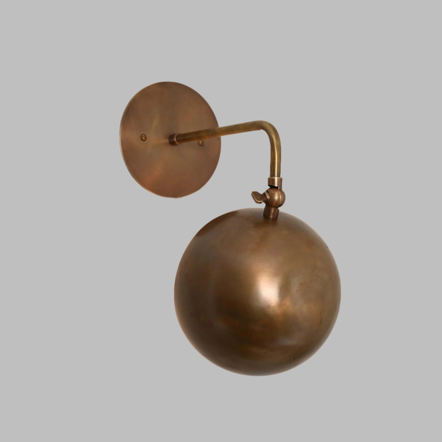 1-Light Mid-Century Wall Sconce in Raw Brass - Illuminate your space with our vintage lamps