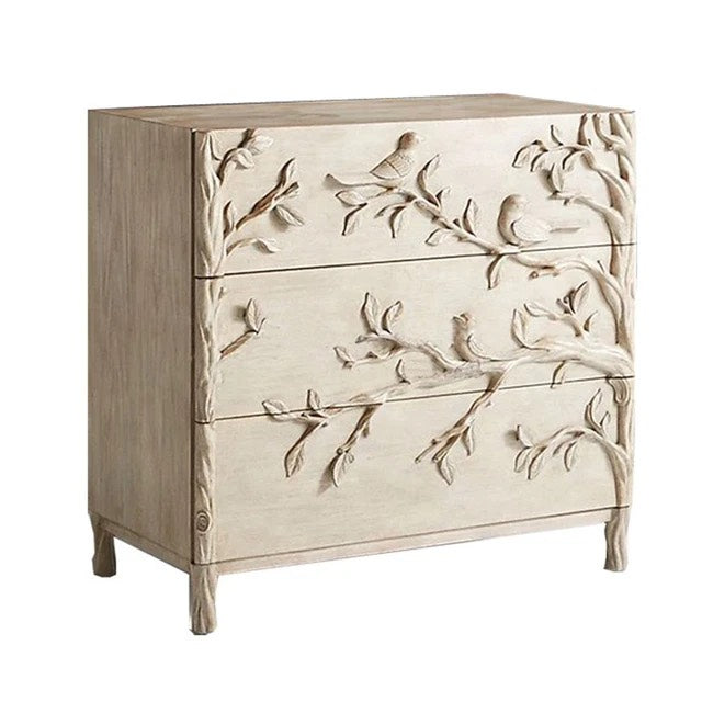 Handcrafted dresser woodland-inspired dresser featuring intricate bird and branch carvings