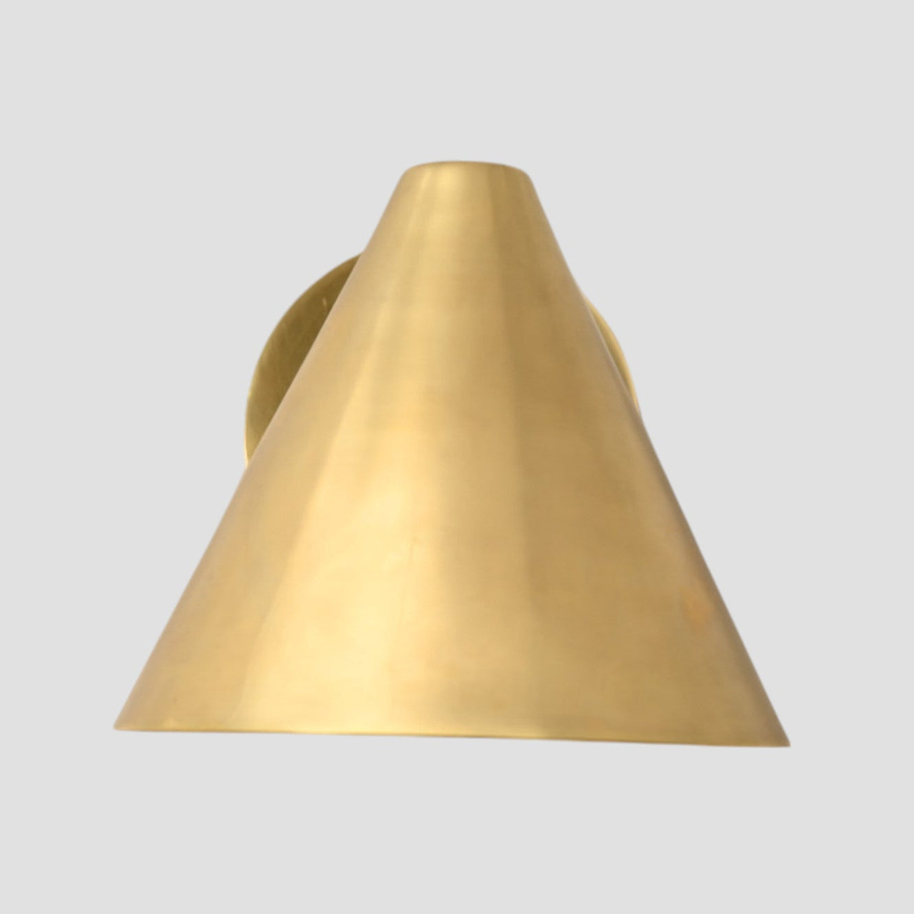 Handmade vintage wall light with a sleek cone shape for timeless, stylish design