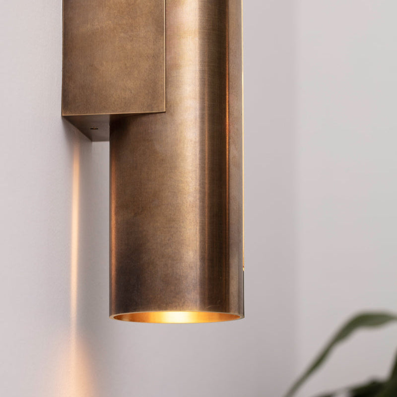 Hand-crafted perforated brass chandelier with unique finish variations for added charm