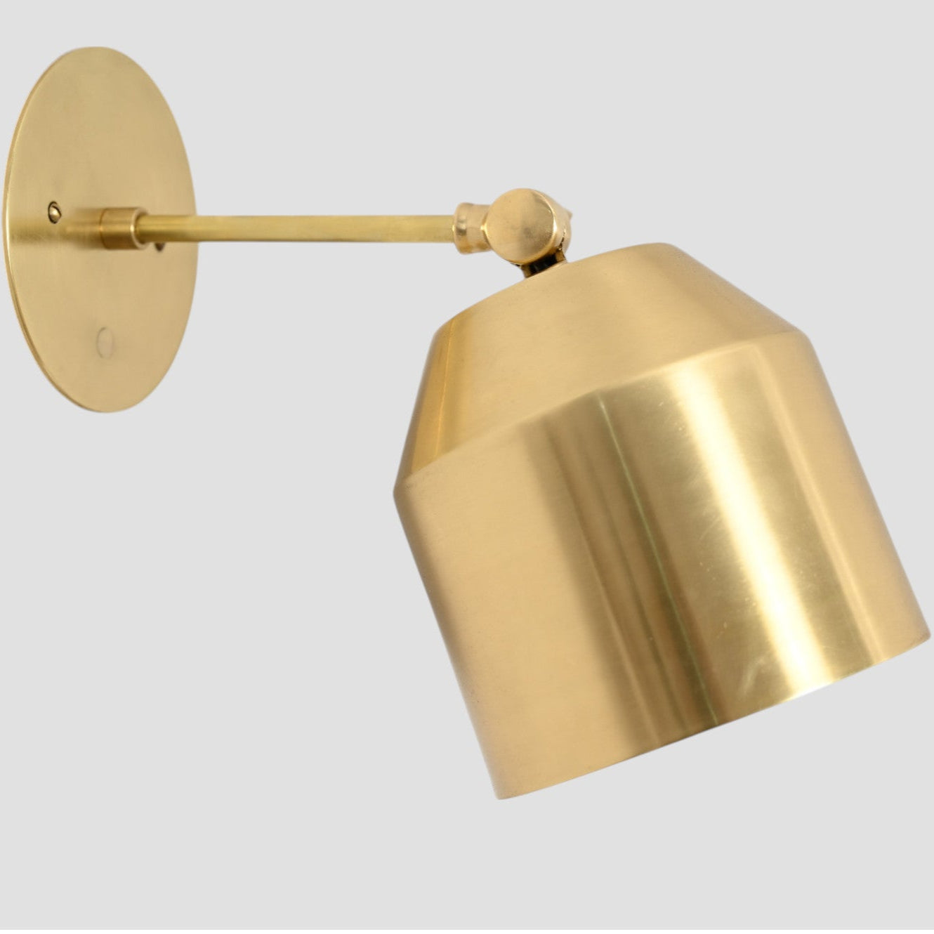 1-light raw brass cone wall sconce—mid-century sputnik style with vintage charm