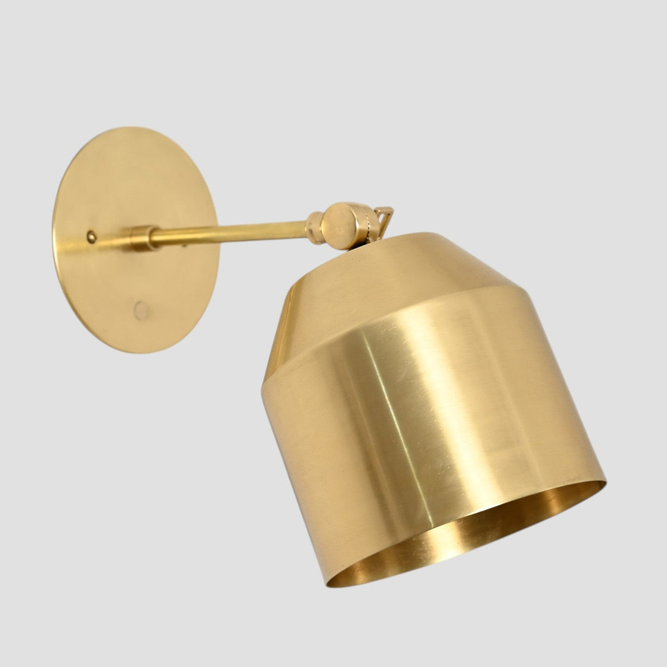 1-light raw brass cone wall sconce—mid-century sputnik style with vintage charm