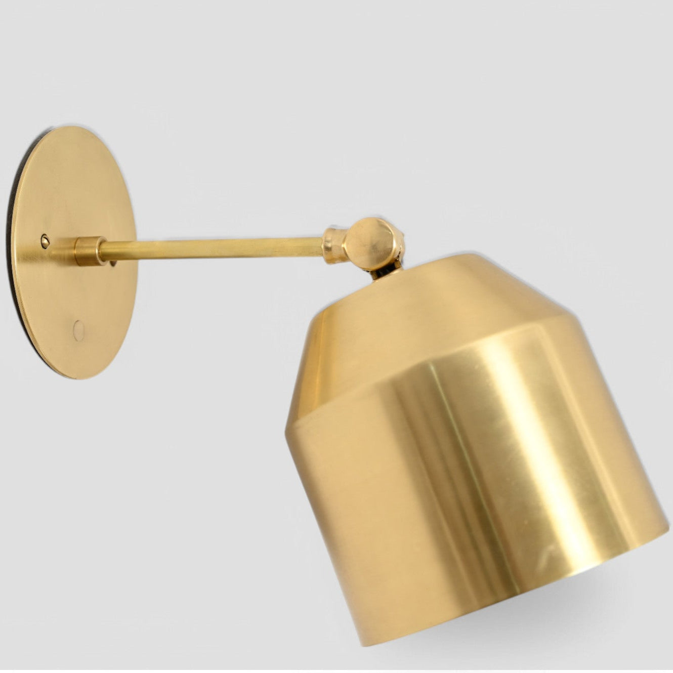 1-light raw brass cone wall sconce—mid-century sputnik style with vintage charm