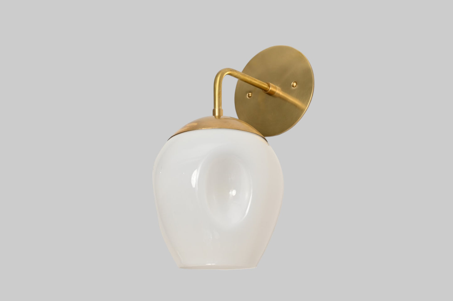 1-Light Dimple Globe Sconce: Raw brass, Mid-Century Modern, sleek stylish lighting accent