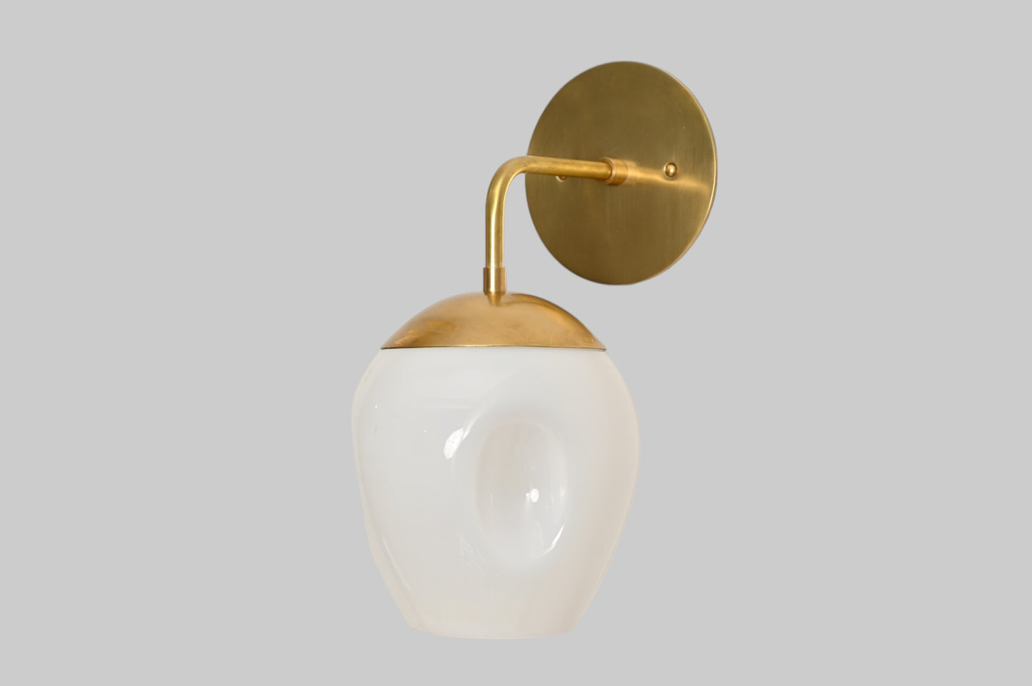 1-Light Dimple Globe Sconce: Raw brass, Mid-Century Modern, sleek stylish lighting accent