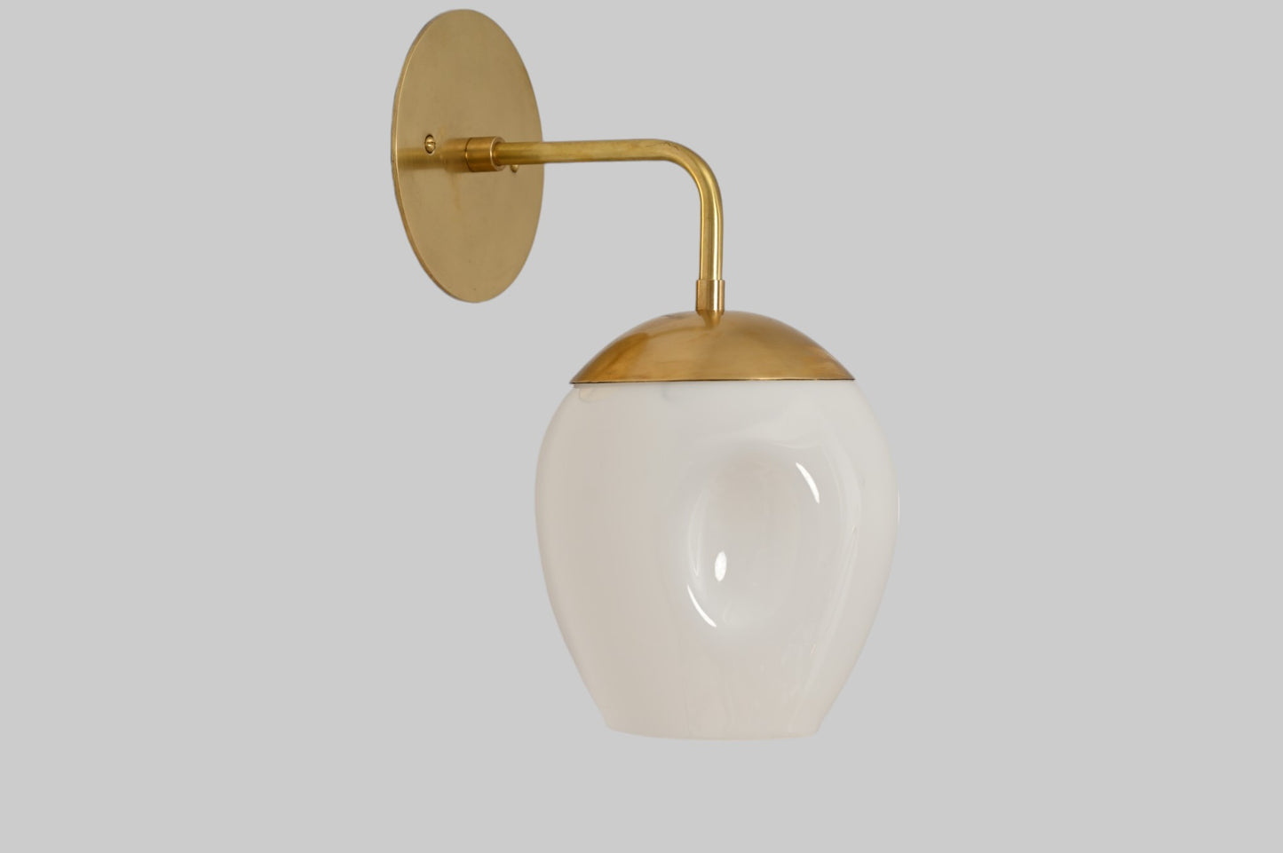 1-Light Dimple Globe Sconce: Raw brass, Mid-Century Modern, sleek stylish lighting accent
