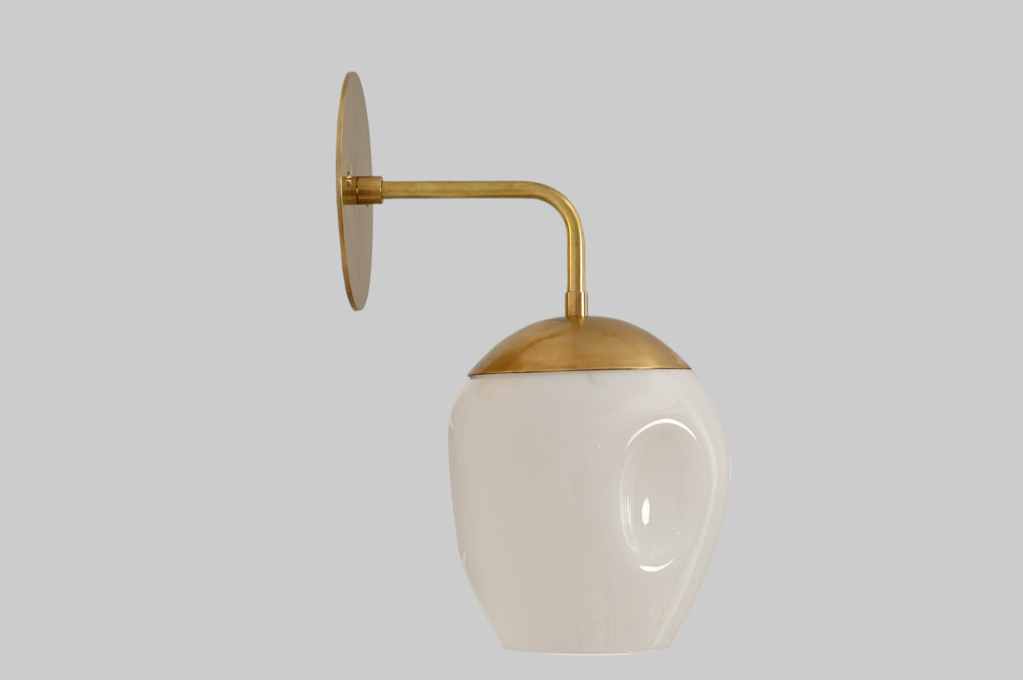 1-Light Dimple Globe Sconce: Raw brass, Mid-Century Modern, sleek stylish lighting accent