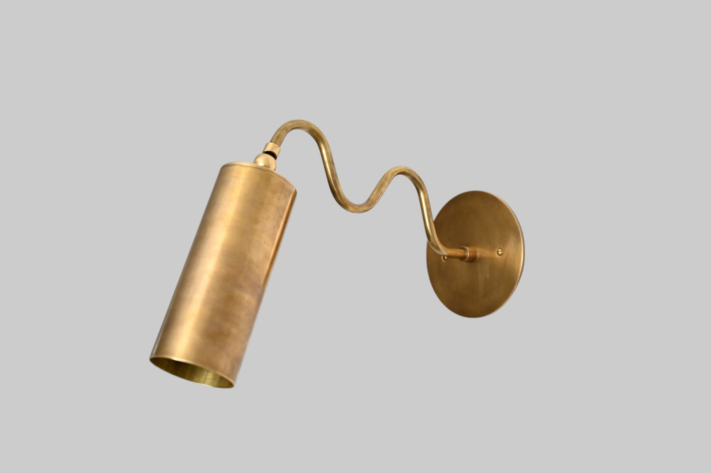 1-Light Italian ZigZag Sconce: Brass, sleek modern design, focused sculptural lighting