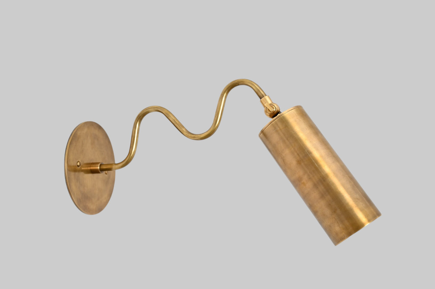 1-Light Italian ZigZag Sconce: Brass, sleek modern design, focused sculptural lighting