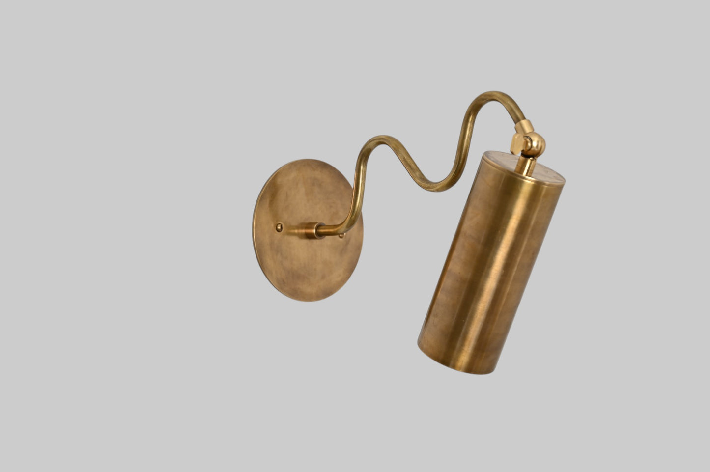 1-Light Italian ZigZag Sconce: Brass, sleek modern design, focused sculptural lighting