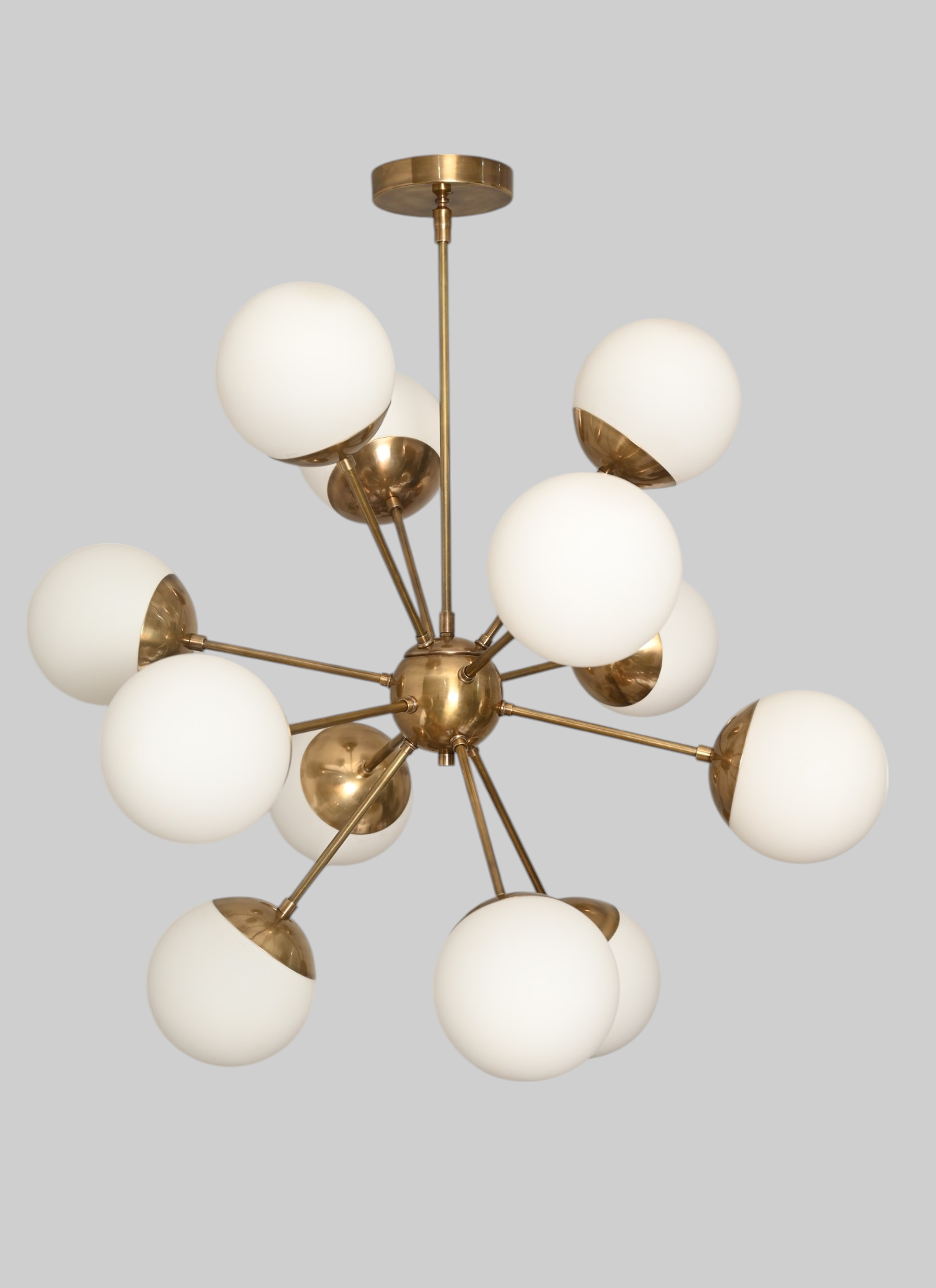 12 Globe Lights chandelier offers stunning, modern design and elegant, ambient lighting.