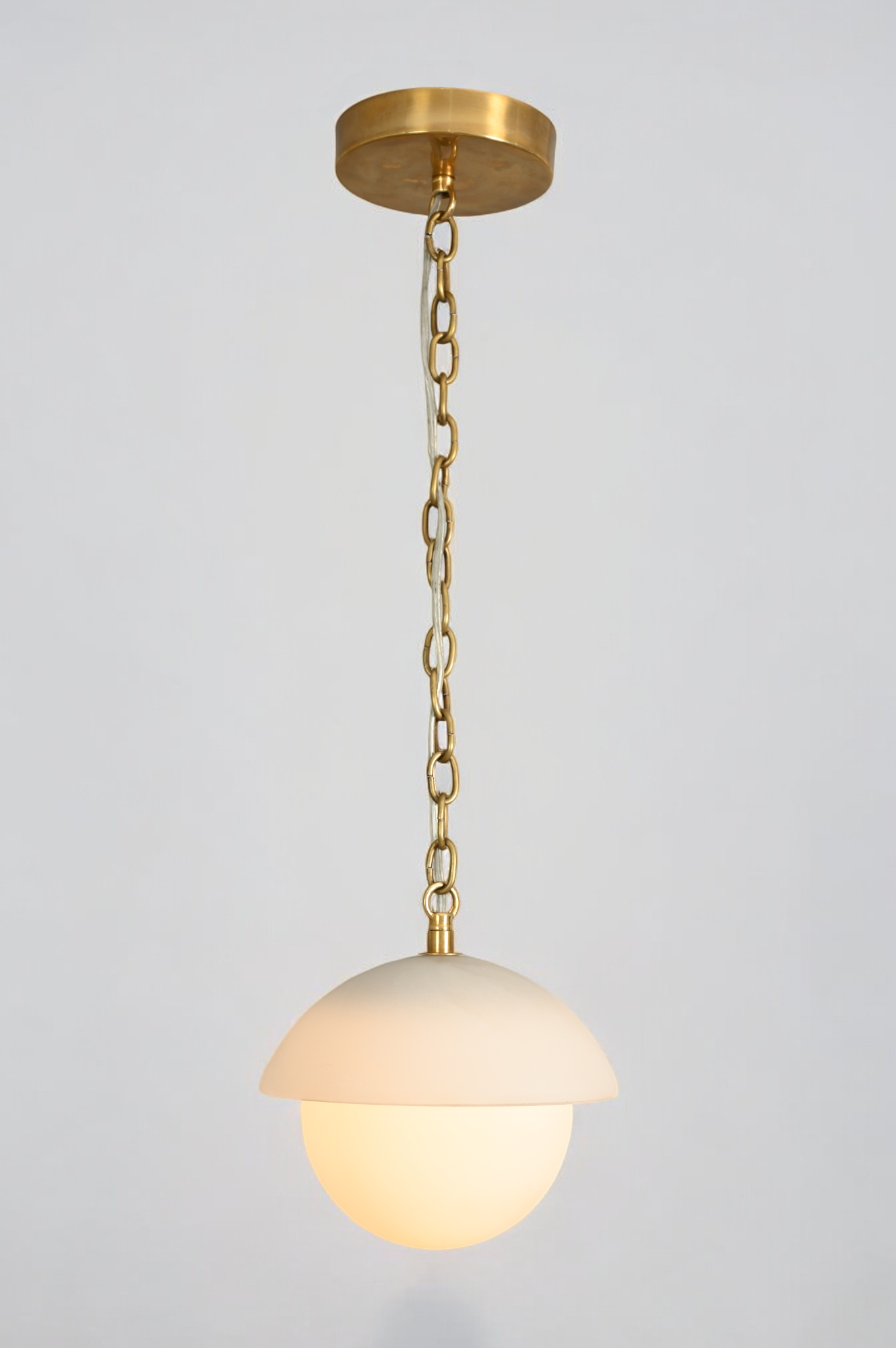 Illuminate your space with the Mid Century Brass Sputnik chandelier and glass shade!