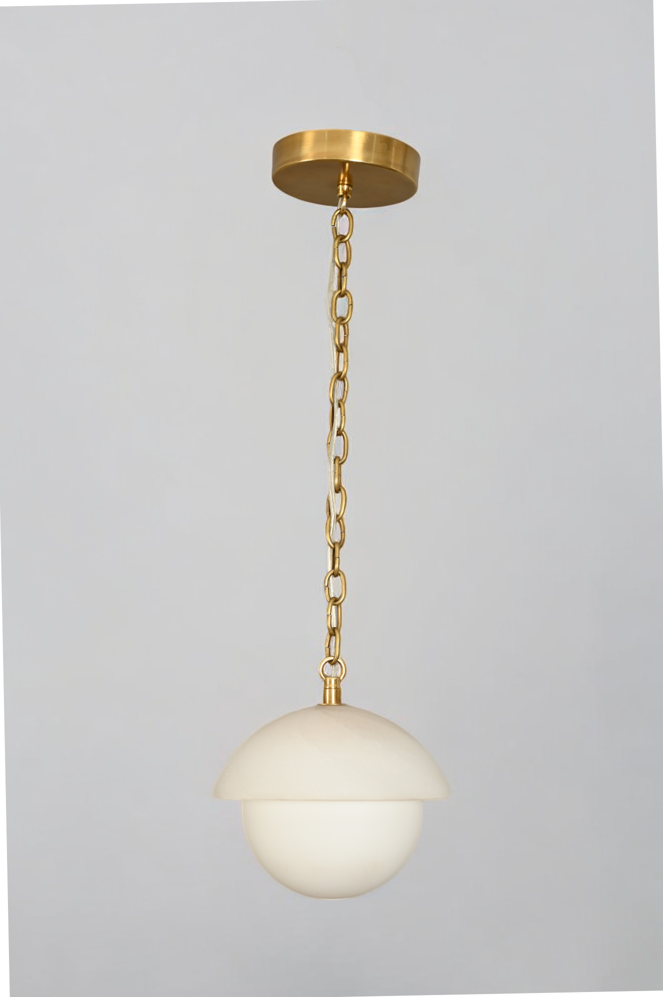 Illuminate your space with the Mid Century Brass Sputnik chandelier and glass shade!