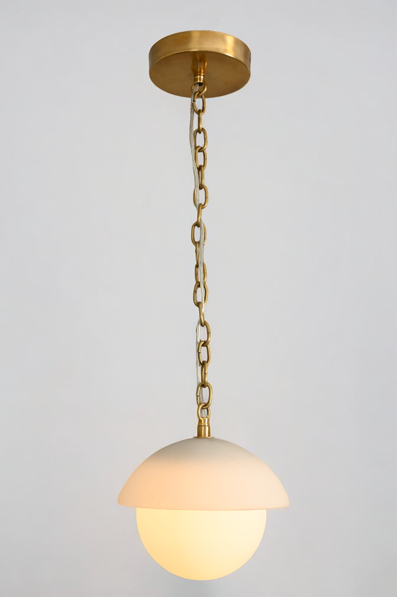 Illuminate your space with the Mid Century Brass Sputnik chandelier and glass shade!