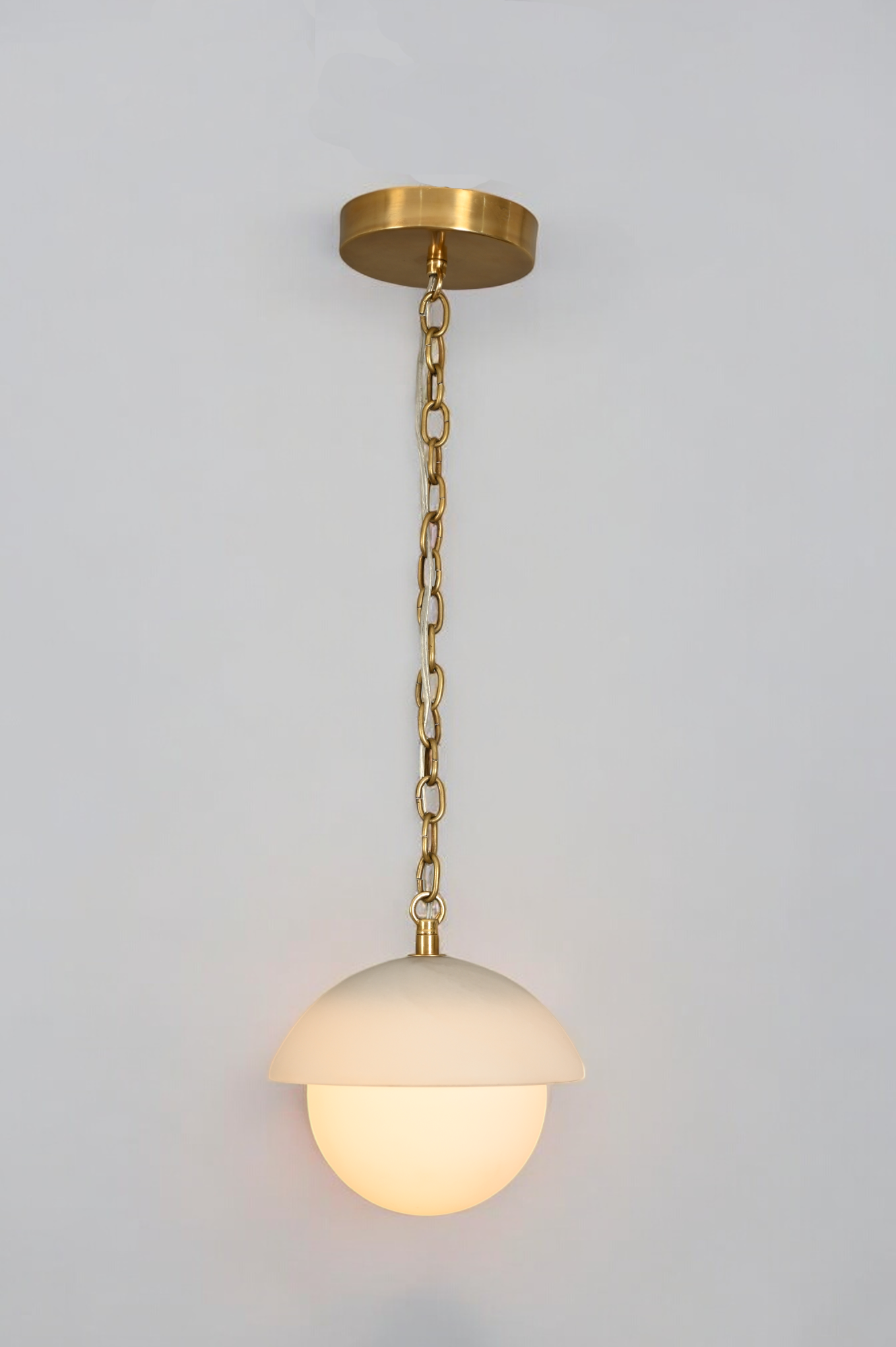 Illuminate your space with the Mid Century Brass Sputnik chandelier and glass shade!