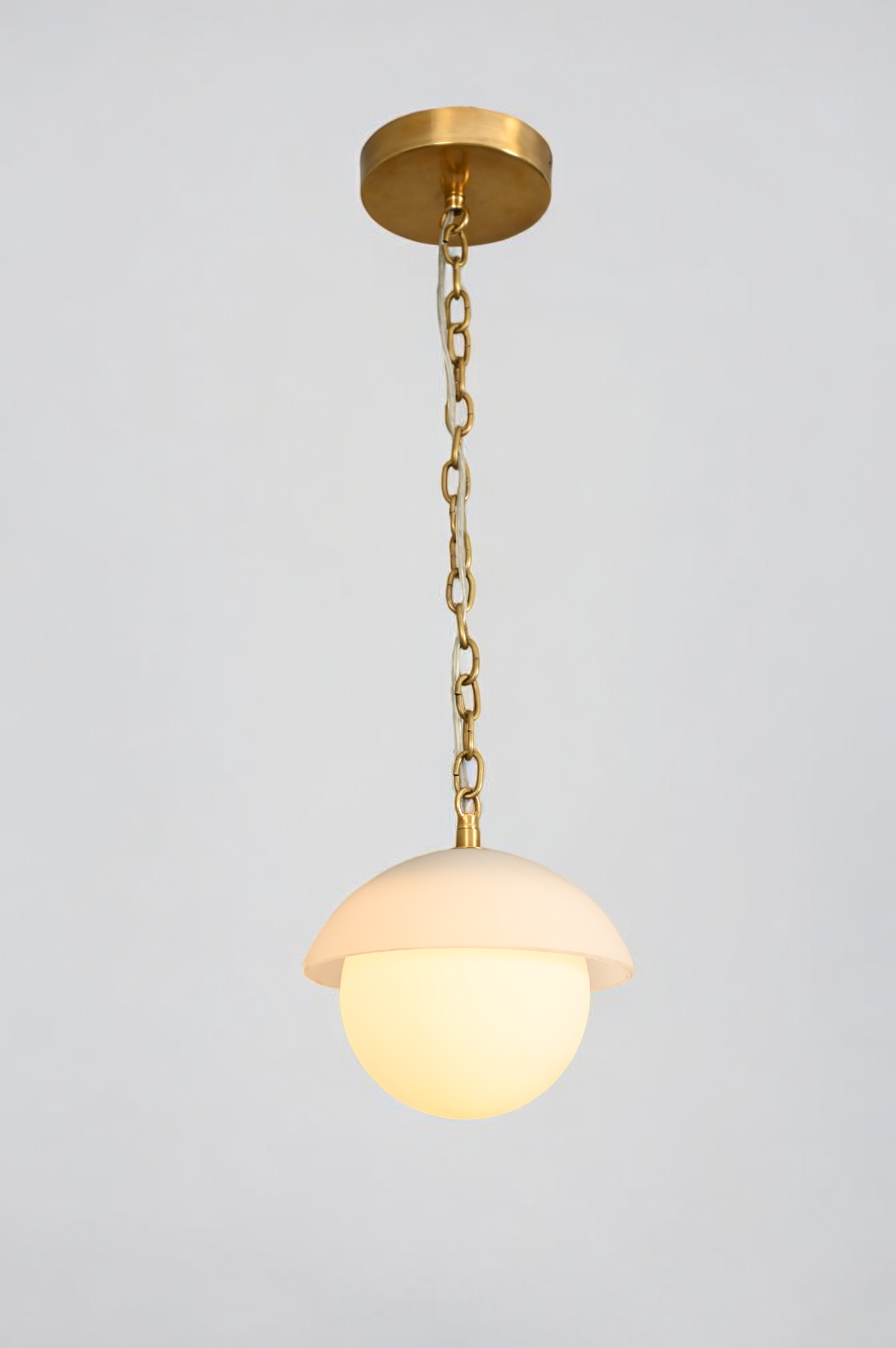 Illuminate your space with the Mid Century Brass Sputnik chandelier and glass shade!