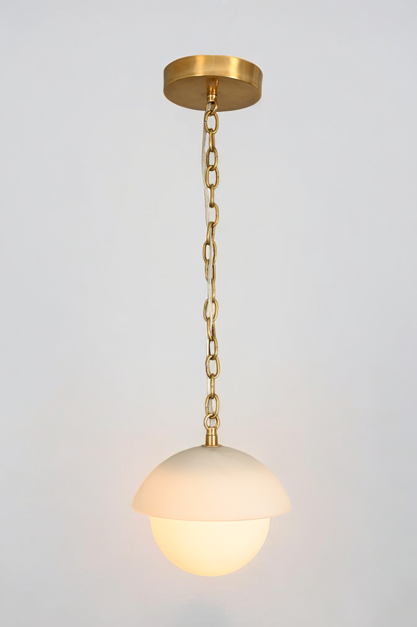 Illuminate your space with the Mid Century Brass Sputnik chandelier and glass shade!