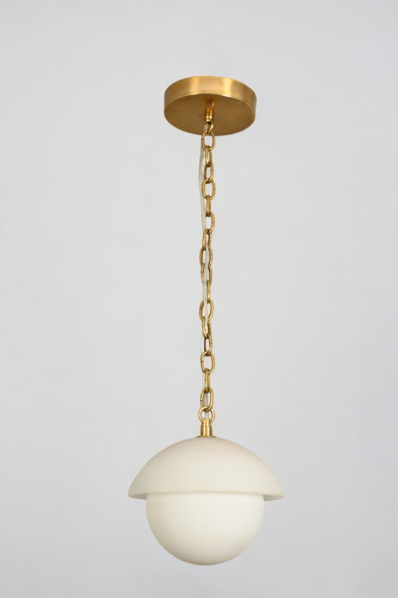 Illuminate your space with the Mid Century Brass Sputnik chandelier and glass shade!