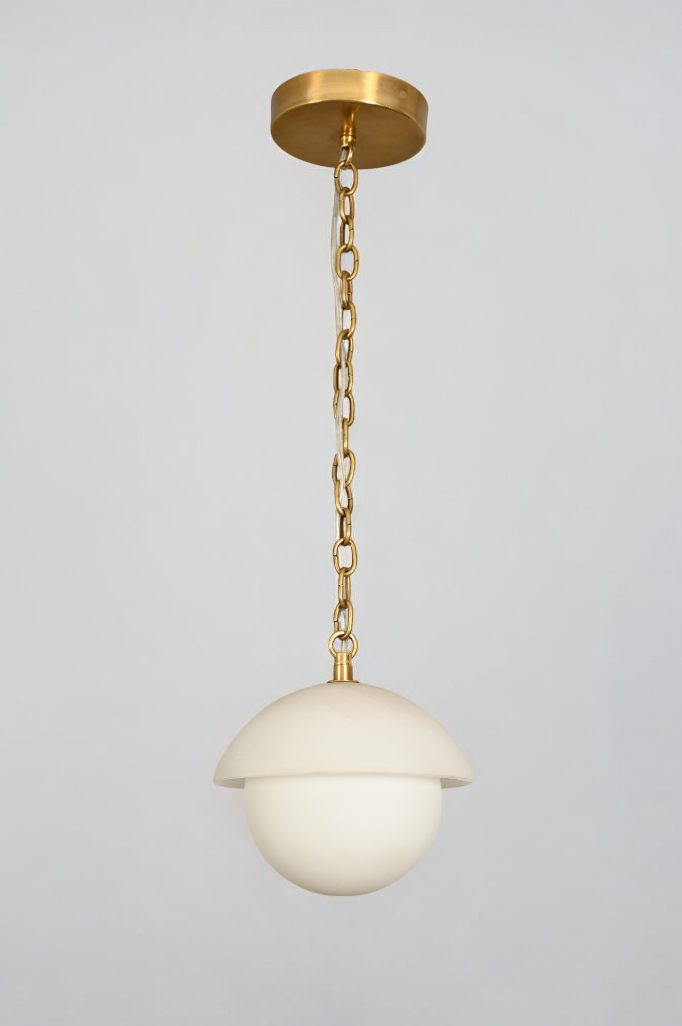 Illuminate your space with the Mid Century Brass Sputnik chandelier and glass shade!