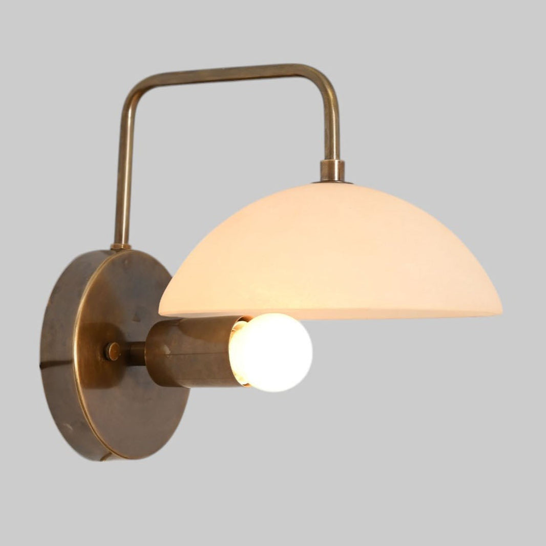 1-light wall fixture with Mid Century Modern Raw Brass Sputnik design, sleek style