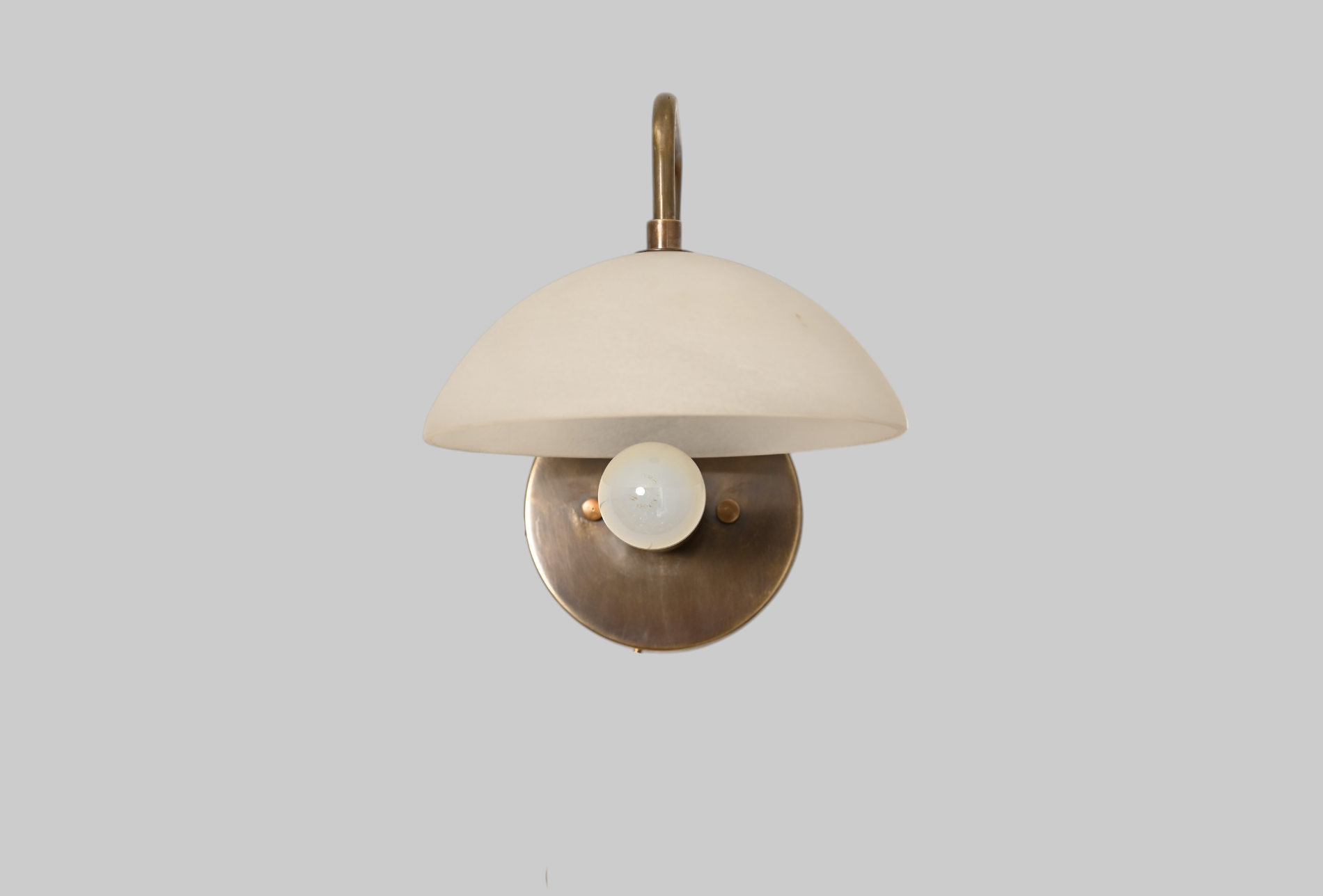 1-light wall fixture with Mid Century Modern Raw Brass Sputnik design, sleek style