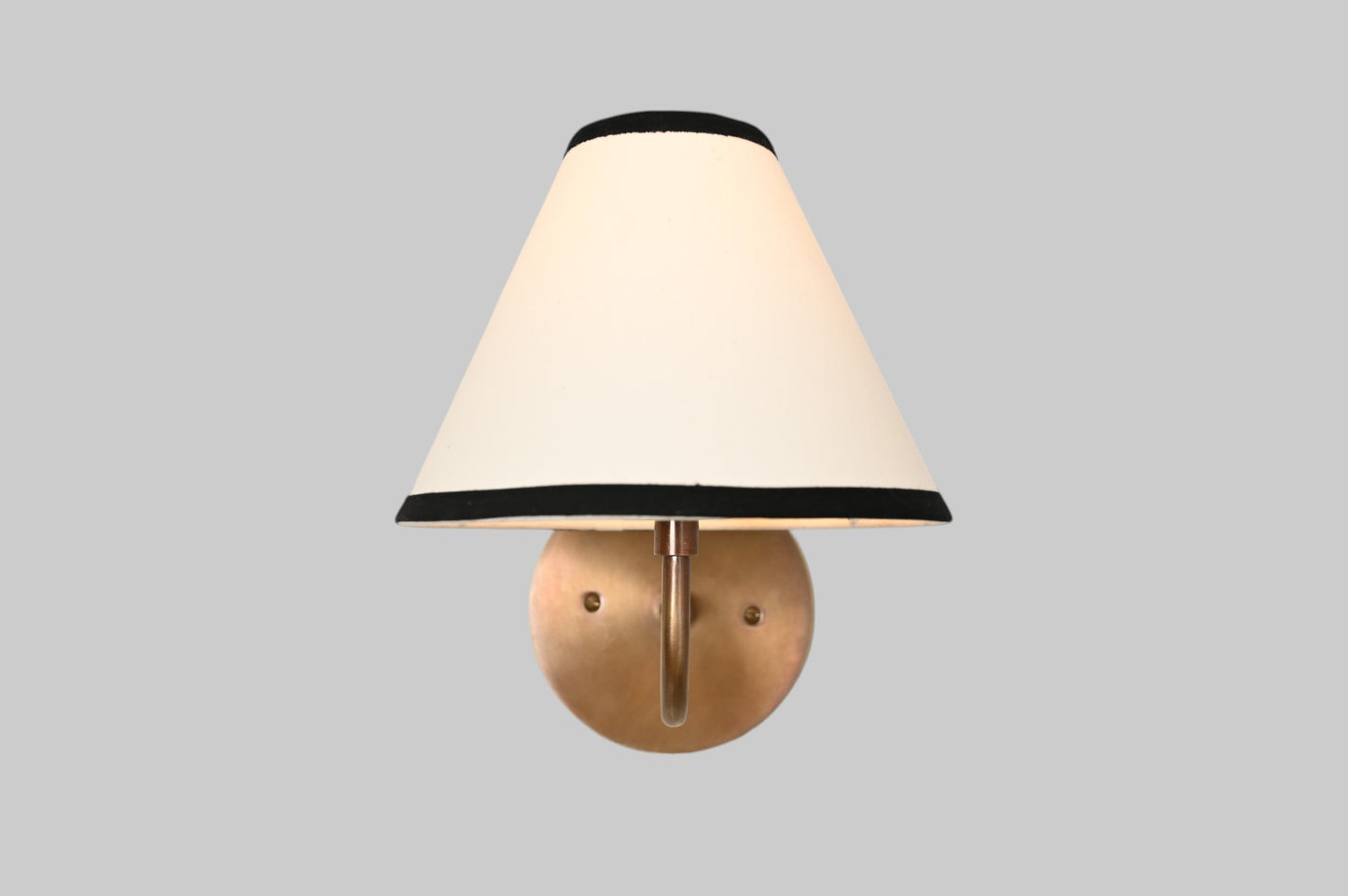 Handcrafted brass chandelier with unique finish variations, enhancing beauty and character