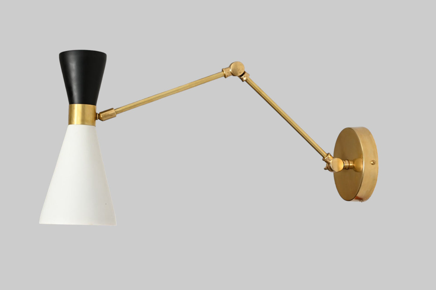 Pure brass and metal shades add timeless elegance and durability to any space
