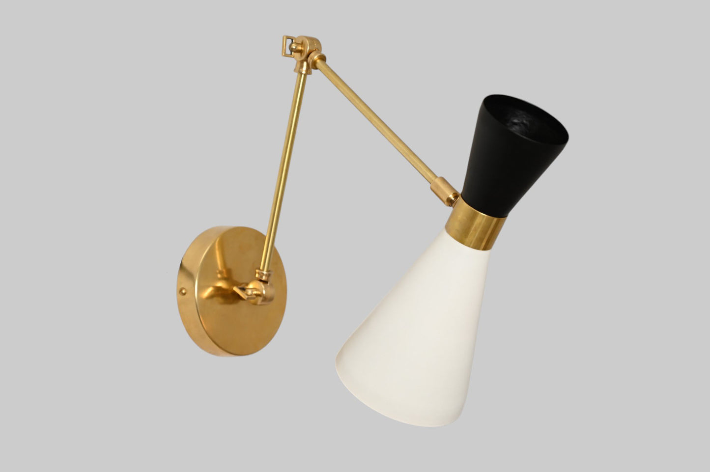 Pure brass and metal shades add timeless elegance and durability to any space