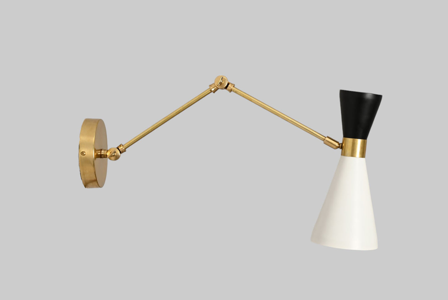 Pure brass and metal shades add timeless elegance and durability to any space