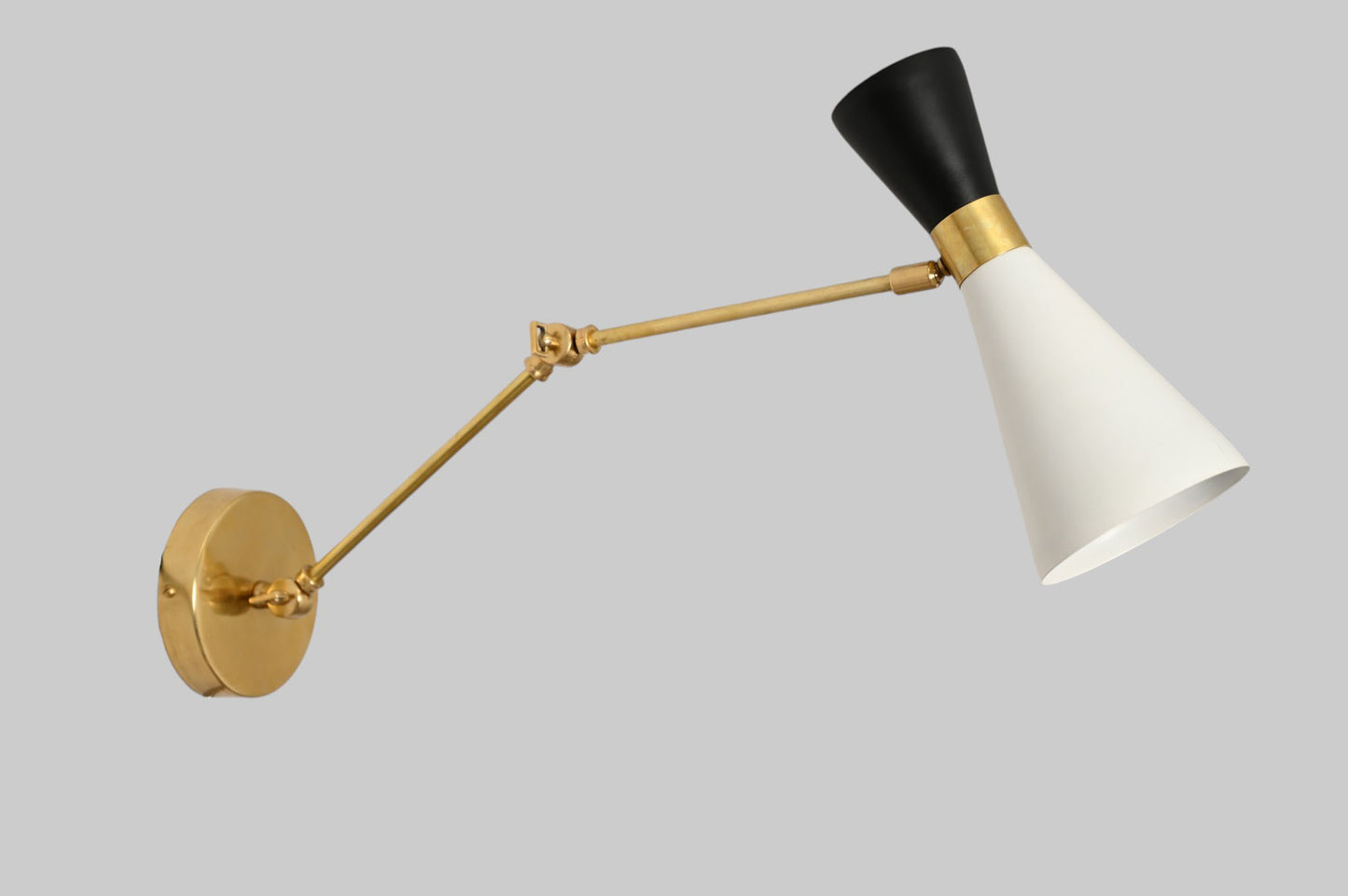 Pure brass and metal shades add timeless elegance and durability to any space