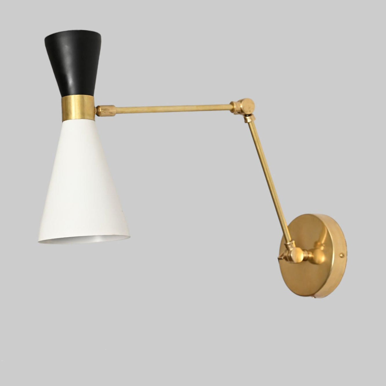 Pure brass and metal shades add timeless elegance and durability to any space