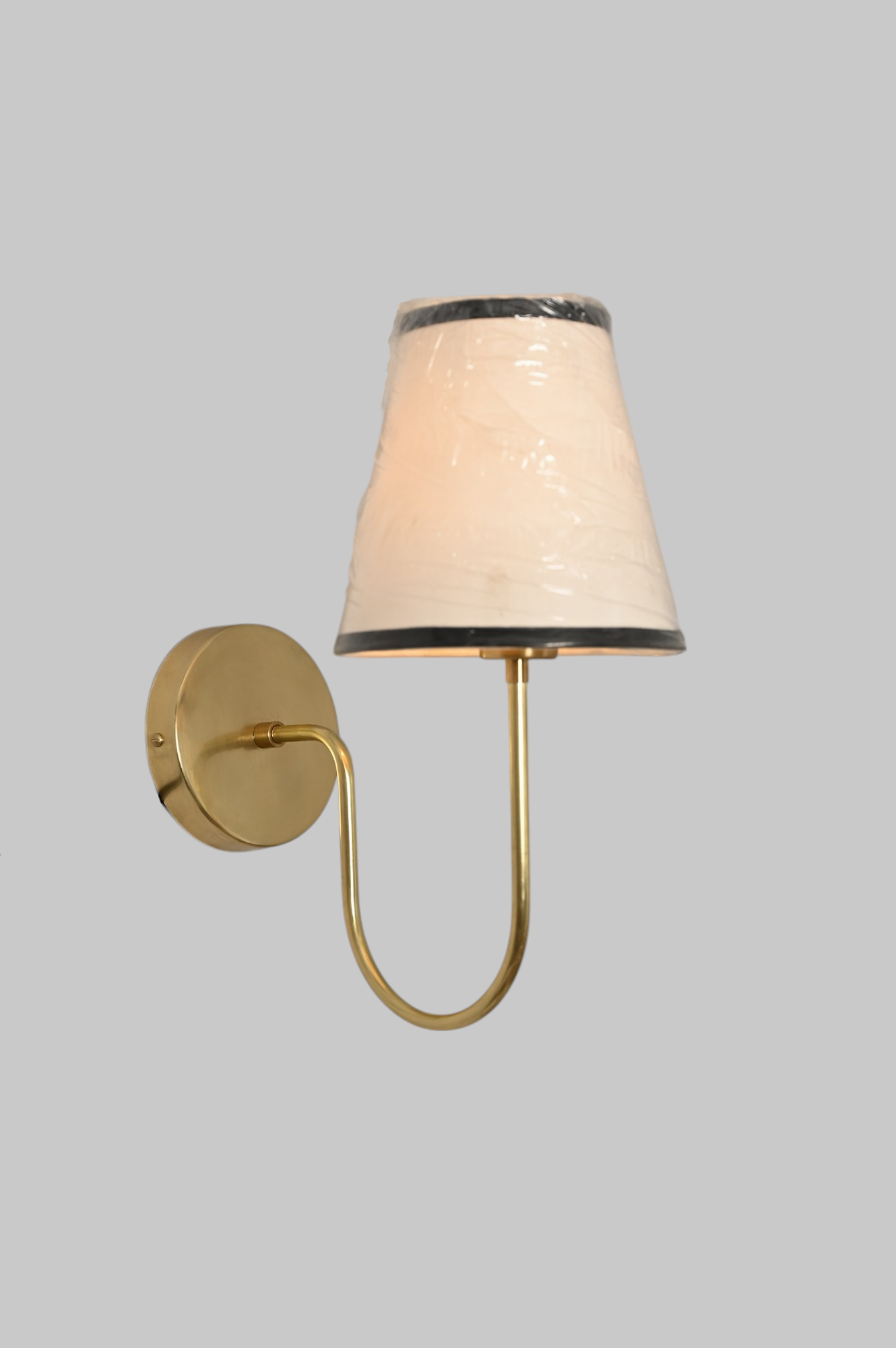 This brass chandelier features natural finish variations, enhancing its unique charm.