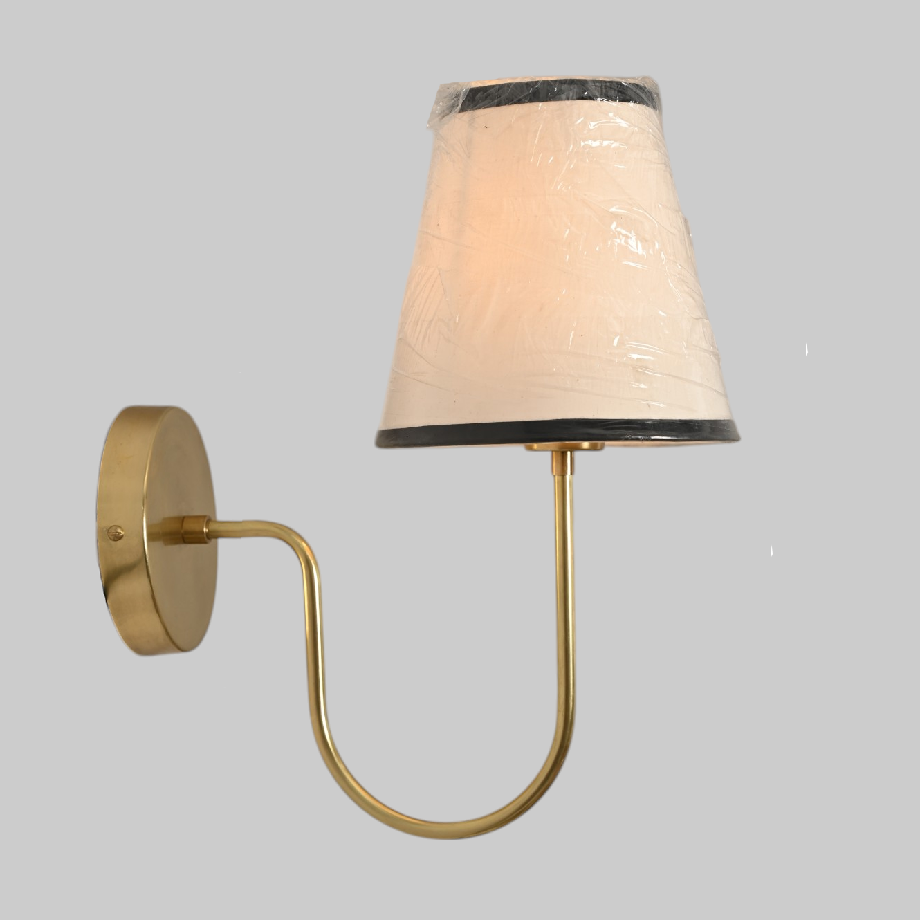 This brass chandelier features natural finish variations, enhancing its unique charm.