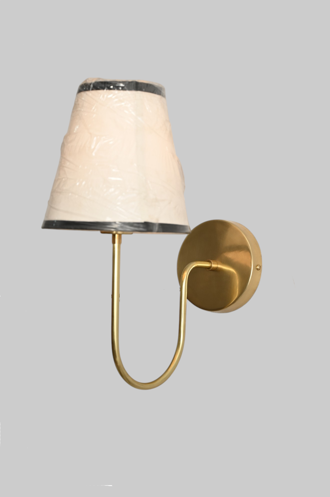 This brass chandelier features natural finish variations, enhancing its unique charm.