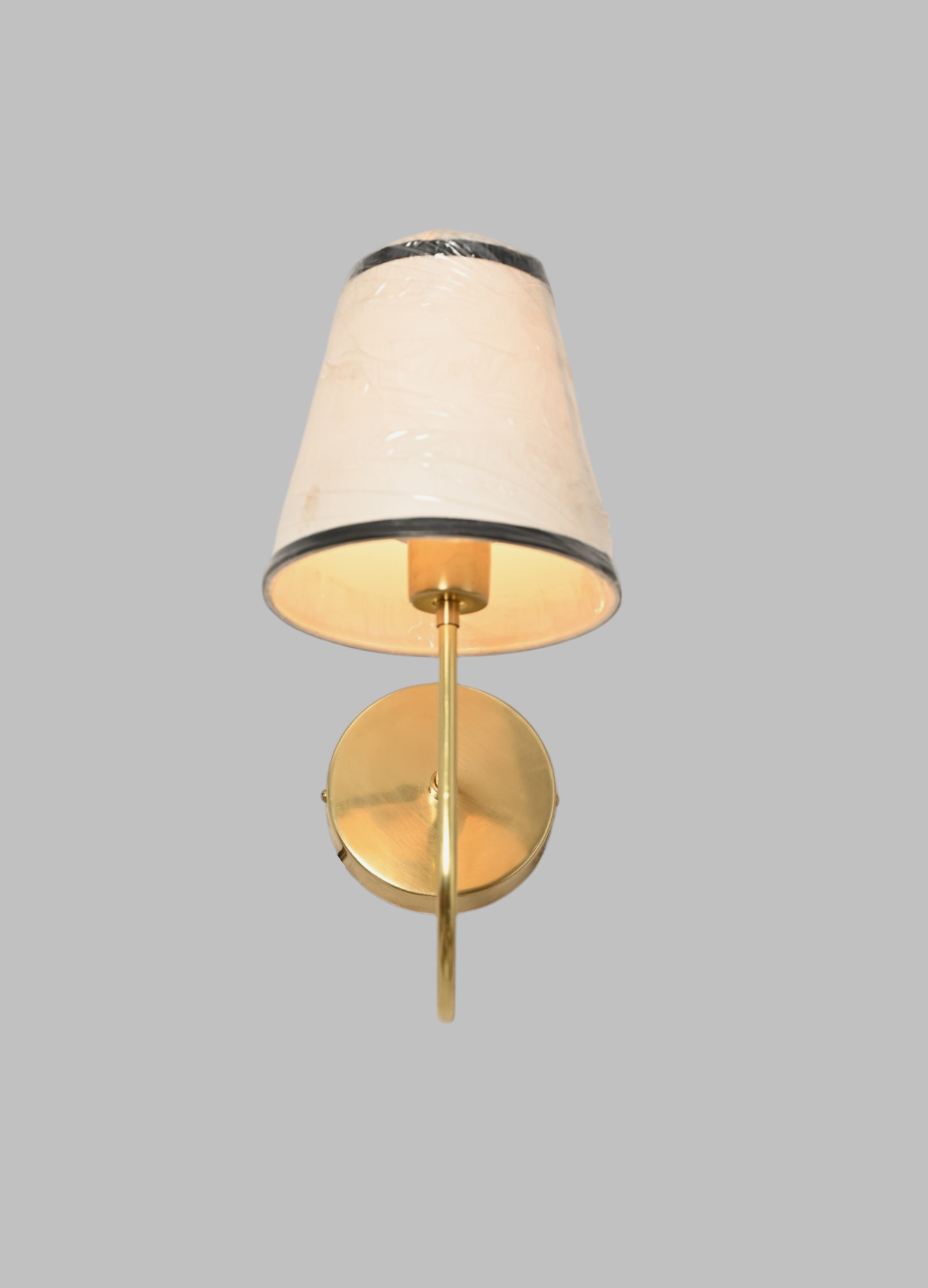 This brass chandelier features natural finish variations, enhancing its unique charm.